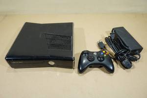 lot 53 image: Xbox 360 20 GB Video Game System with Wireless Controller
