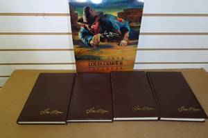 lot 259 image: 4 Louis LAmour Books with Calendar