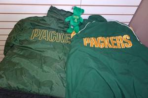 lot 270 image: 2 Green Bay Packers Jackets with Brett Favre Beanie Baby -Large