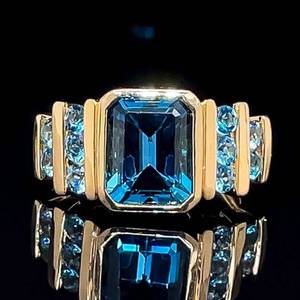Emerald Cut Blue Topaz Step-Tiered Channel Ring in Yellow Gold $1,750 Retail