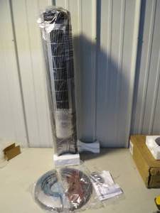 lot 96 image: Lasko 42 Wind Curve Oscillating Space Saver Fan with Remote Control