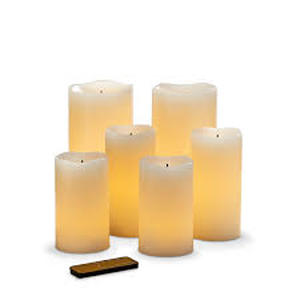 lot 8 image: Glow Wick Cream LED Pillar Candles, 6 Pack