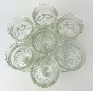 lot 27 image: 7 Tiffin Kings Crown Clear Thumbprint Pattern Wine Glasses