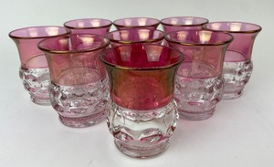 lot 56 image: 9 Tiffin Kings Crown Thumbprint Pattern Ruby Flashed Iridescent Gold Rimmed Glasses