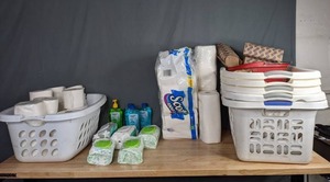 lot 102 image: Assortment of Laundry Baskets, Baby Wipes, Aloe Vera Gel, Toilet Paper, and Paper Towels B