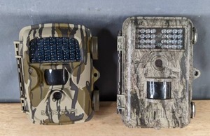 lot 32 image: Mossy Oak GameKeepers Shadow Game Camera and Bushnell Trophy Trail Camera B