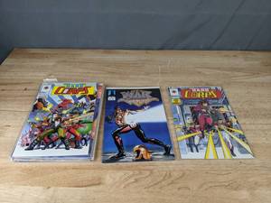 lot 77 image: A Collection of 20 Various Comic Books Including Will to Power, Images of Shadow Hawk, Harbinger and More  K