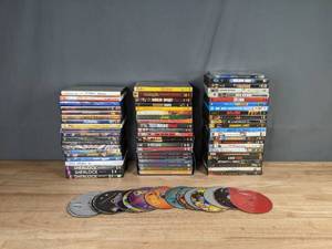lot 56 image: Assorted Movies DVDs including Disney, Sherlock, NCIS, The Wonder Years and so Much More K