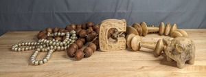 lot 180 image: Wood Bead GarlandsNecklaces, Carved Wood Letter C,Pottery Barn Wooden Pig Decor F