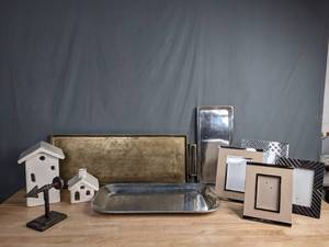 lot 222 image: Miscellaneous Pottery Barn Decor - Wrought Iron Bookend, Ceramic Christmas Village Houses, Decorative TraysCandle Trays, Picture Frames F