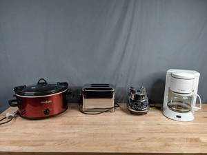 lot 230 image: Small Kitchen Appliances - Large Crockpot Slow Cooker, 2-Slice Toaster, Cuisinart Blender Base, Mr. Coffee Coffee Maker F