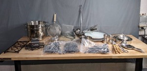 lot 216 image: Kitchen Essentials, Including Crate & Barrel Multi-Cooker Pot, Calphalon Saute Pan, Eating & Cooking Utensils, Trivets, Measuring Cups and More F
