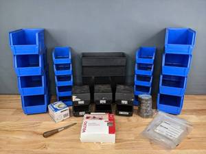lot 314 image: Brinks Mechanical Timer, PVC Electrical Tape, Roll of Velcro Tape and Blue and Black Plastic Bins   T