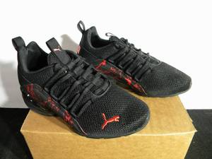 lot 56 image: kids Black Puma Shoes Size 5.5