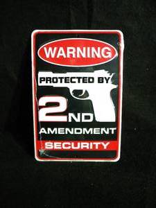 lot 178 image: Metal Garage Sigh Protected by 2nd Amendment