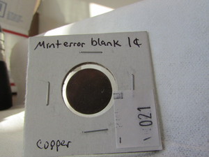 lot 21 image: MINT ERROR LINCLON CENT COPPER BLANK