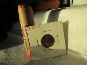 lot 79 image: ROLL OF MIXED DATE WHEAT CENTS 1909-1958 WITH A 1904 INDIAN HEAD CENT