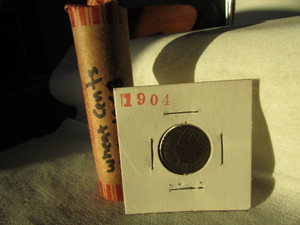 lot 80 image: ROLL OF MIXED DATE WHEAT CENTS 1909-1958 WITH A 1904 INDIAN HEAD CENT
