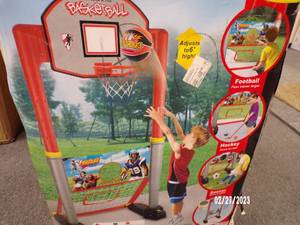 lot 21 image: Open Box Item - Looks New 4-in-1 Super Multi-Sport Game Set - Play Football, Hockey, Basketball, Soccer