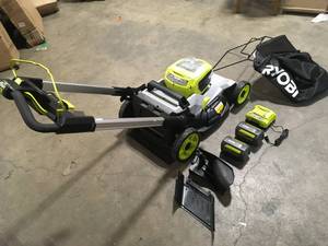 40V HP Brushless 21 in. Cordless Battery Walk Behind Self-Propelled Mower with (2) Batteries, Charger, Lawn & Leaf Bag by RYOBI Customer Returns See Pictures