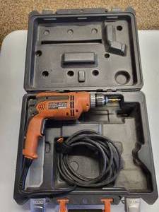 lot 24 image: Ridgid 38 Corded Drill Model # R7000