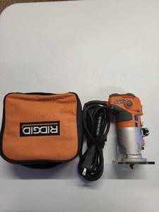 lot 37 image: Ridgid R2401 1.5HP 5.5A Corded Compact Router W Case & Accessories