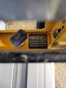 lot 56 image: Dewalt Miter Saw Stand Work Piece Support and Length Stop Model #DW7232