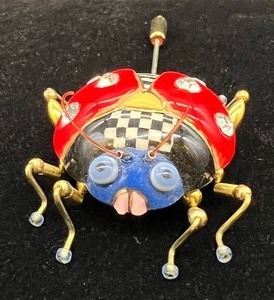 lot 144 image: Cynthia Chuang Lady Bug Stick Pin