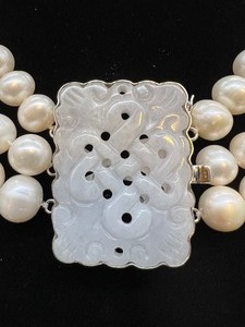 lot 140 image: Jade and Pearl Three Strand Necklace