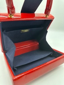 lot 108 image: Vintage Delicate by Mary Kay Red Patent Leather Handbag
