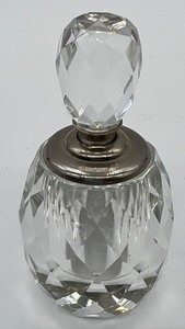 lot 131 image: Vintage Oleg Cassini Crystal Perfume Bottle Pair with Screw Top
