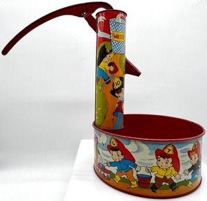 lot 187 image: Vintage Tin Litho Water Well FireFighter Ohio Art, Glass Candy Gun & Bronco Hankie