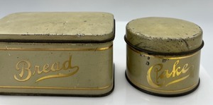 lot 2 image: Antique Childs Tin Toy Canister Set