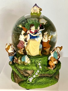 lot 236 image: Walt Disney Snow White Snow Globe and Plush Dwarfs