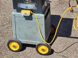 lot 127 image: Portable Table Saw on Wheels