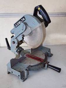 lot 128 image: Delta Miter Saw
