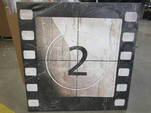 lot 315 image: Film Countdown Print on Canvas With Wood Frame. Approximate Dimensions 35 x 35 - SOLD AS IS