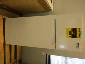 lot 35 image: Magic Chef  7.3 cu. ft. 2-Door Mini Fridge in White with Freezer (SMALL DENT ON FRIDGE DOOR, OTHERWISE NICE CONDITION)