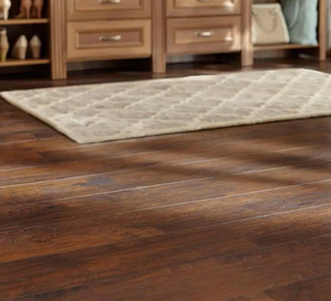 lot 58 image: LOT OF 3 TrafficMaster  Hand scraped Saratoga Hickory 7 mm Thick x 7-23 in. Wide x 50-58 in. Length Laminate Flooring (24.17 sq. ft.  case) APPROXIMATELY 72 SQ FT TOTAL