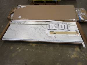 lot 56 image: Hampton Bay  Wilsonart 6 ft Straight Laminate Countertop Kit Included in Gloss Calcutta Marble with Full Wrap Ogee Edge & Backsplash (SMALL DING IN BACK CORNER)
