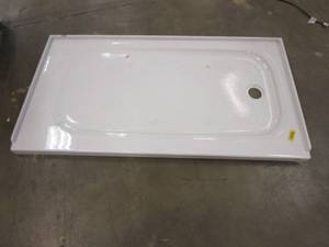 lot 64 image: American Standard  Passage Right Hand Drain 32 in. x 60 in. Single Threshold Shower Base in White (TILE FLANGE CHIPPED, BASE SCUFFED, SEE PHOTOS)
