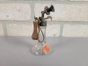 lot 333 image: Antique Hello Sweetheart Candlestick Telephone Candy Bottle - 1907 Patent No. 852242