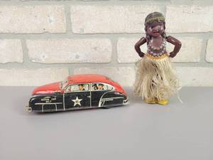 lot 344 image: Vintage LUPOR Tin Litho Police Car and Wind-Up Dancing Hula Girl (Made in Japan)