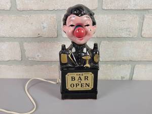 lot 396 image: Vintage The Bar is Open Bartender Lamp w Red Nose - WORKS