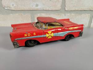 lot 409 image: Vintage Ford Fairlane Fire Chief Tin Litho Friction Car