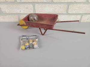 lot 471 image: Tin Wheelbarrow and Marbles
