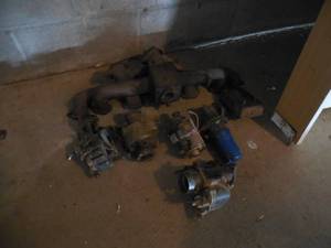 lot 10 image: Assorted Car parts Carbs, Manifold, Starter