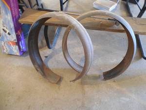 lot 15 image: Spare tire covers for a Model A