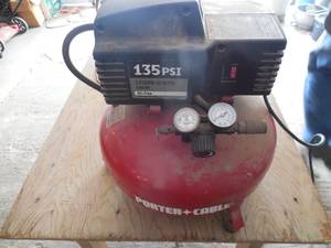 lot 97 image: Porta Cable Air compressor