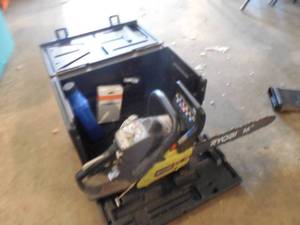 lot 109 image: Ryobi Chain saw with case